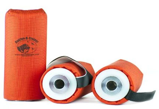 Huvudbild Dummy till apportkastare Orange tyg med svart streamer Längd ca 18 cm Diameter ca 8 cm RRT